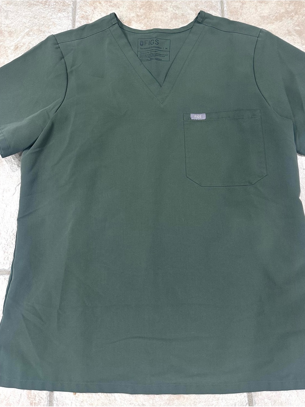 Figs Women’s Short Sleeve V‑Neck Top in Forest Green